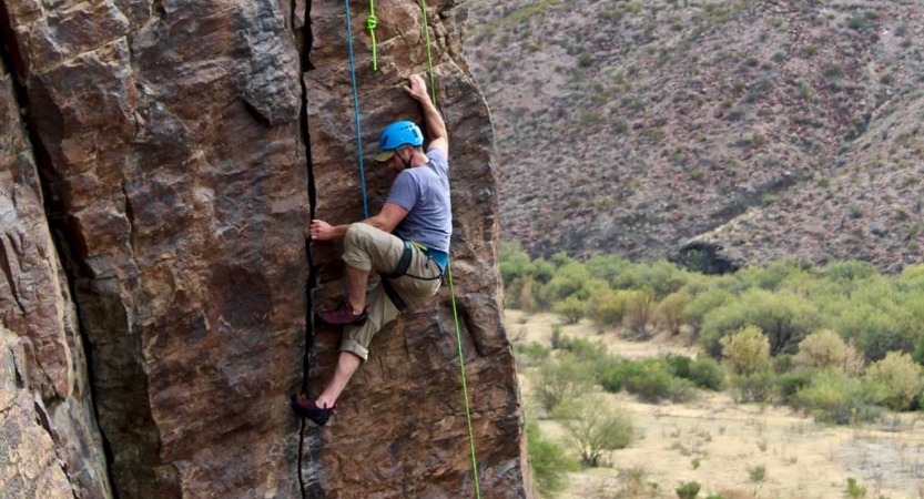 adults unplug on rock climbing course